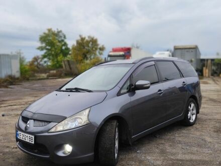 Серый Мицубиси Грандис, объемом двигателя 2.4 л и пробегом 180 тыс. км за 7500 $, фото 1 на Automoto.ua