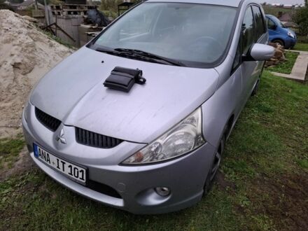 Серый Мицубиси Грандис, объемом двигателя 2 л и пробегом 237 тыс. км за 3500 $, фото 1 на Automoto.ua