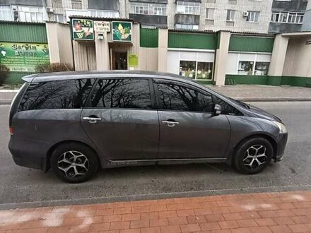 Серый Мицубиси Грандис, объемом двигателя 2.38 л и пробегом 153 тыс. км за 7300 $, фото 1 на Automoto.ua