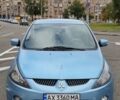 Синий Мицубиси Грандис, объемом двигателя 2.4 л и пробегом 305 тыс. км за 6500 $, фото 1 на Automoto.ua