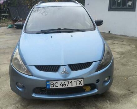 Синий Мицубиси Грандис, объемом двигателя 2.4 л и пробегом 350 тыс. км за 5450 $, фото 1 на Automoto.ua