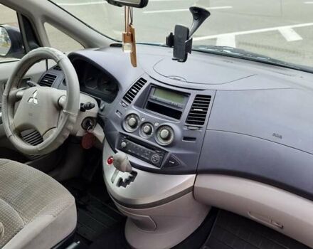 Синий Мицубиси Грандис, объемом двигателя 2.4 л и пробегом 307 тыс. км за 5700 $, фото 3 на Automoto.ua