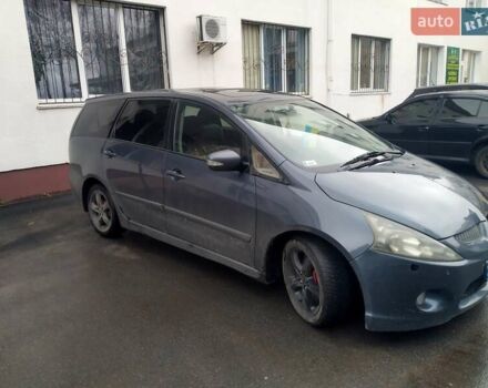 Синий Мицубиси Грандис, объемом двигателя 2 л и пробегом 267 тыс. км за 7000 $, фото 1 на Automoto.ua