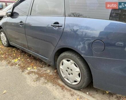 Синий Мицубиси Грандис, объемом двигателя 2.4 л и пробегом 266 тыс. км за 5200 $, фото 1 на Automoto.ua