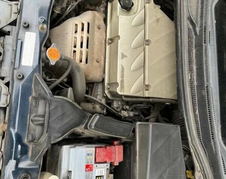 Синий Мицубиси Грандис, объемом двигателя 2.4 л и пробегом 266 тыс. км за 5200 $, фото 5 на Automoto.ua