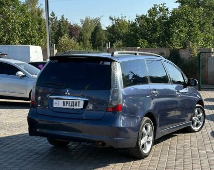 Синий Мицубиси Грандис, объемом двигателя 2.4 л и пробегом 236 тыс. км за 6400 $, фото 3 на Automoto.ua