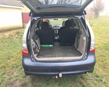 Синий Мицубиси Грандис, объемом двигателя 2 л и пробегом 291 тыс. км за 5400 $, фото 6 на Automoto.ua