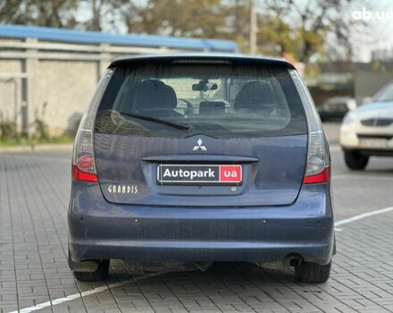 Синий Мицубиси Грандис, объемом двигателя 2.4 л и пробегом 250 тыс. км за 6490 $, фото 4 на Automoto.ua
