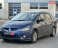 Синий Мицубиси Грандис, объемом двигателя 2.4 л и пробегом 250 тыс. км за 6440 $, фото 1 на Automoto.ua