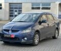 Синий Мицубиси Грандис, объемом двигателя 2.4 л и пробегом 250 тыс. км за 6490 $, фото 1 на Automoto.ua