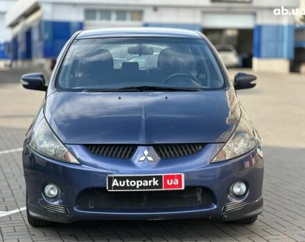 Синий Мицубиси Грандис, объемом двигателя 2.4 л и пробегом 250 тыс. км за 6490 $, фото 1 на Automoto.ua