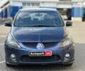 Синий Мицубиси Грандис, объемом двигателя 2.4 л и пробегом 250 тыс. км за 6490 $, фото 1 на Automoto.ua
