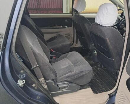 Синий Мицубиси Грандис, объемом двигателя 2 л и пробегом 291 тыс. км за 5400 $, фото 3 на Automoto.ua