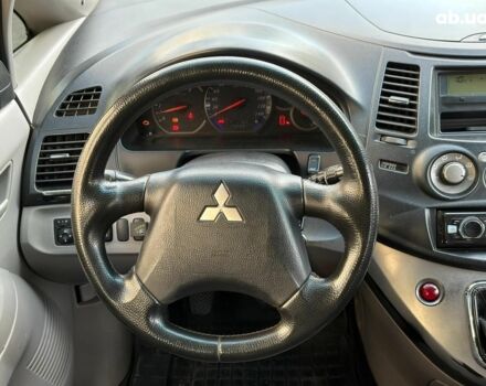 Синий Мицубиси Грандис, объемом двигателя 2.4 л и пробегом 250 тыс. км за 6490 $, фото 16 на Automoto.ua
