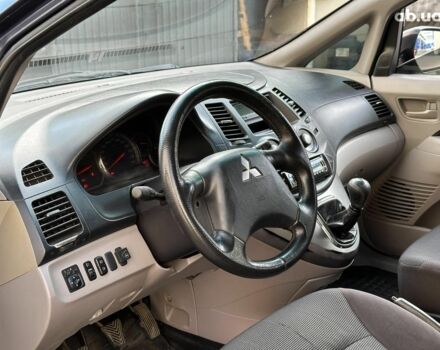 Синий Мицубиси Грандис, объемом двигателя 2.4 л и пробегом 250 тыс. км за 6490 $, фото 6 на Automoto.ua