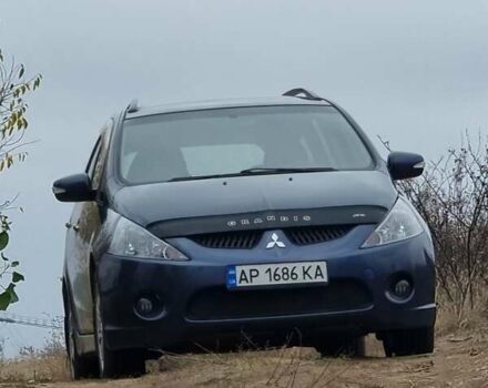 Синий Мицубиси Грандис, объемом двигателя 2.38 л и пробегом 220 тыс. км за 6500 $, фото 1 на Automoto.ua