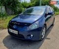 Синий Мицубиси Грандис, объемом двигателя 2.38 л и пробегом 220 тыс. км за 6500 $, фото 1 на Automoto.ua