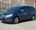 Синий Мицубиси Грандис, объемом двигателя 2.38 л и пробегом 280 тыс. км за 5600 $, фото 1 на Automoto.ua