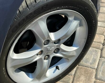 Синий Мицубиси Грандис, объемом двигателя 2.4 л и пробегом 236 тыс. км за 6400 $, фото 2 на Automoto.ua