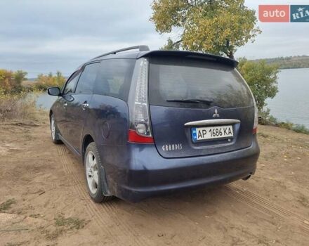 Синий Мицубиси Грандис, объемом двигателя 2.38 л и пробегом 220 тыс. км за 6500 $, фото 4 на Automoto.ua