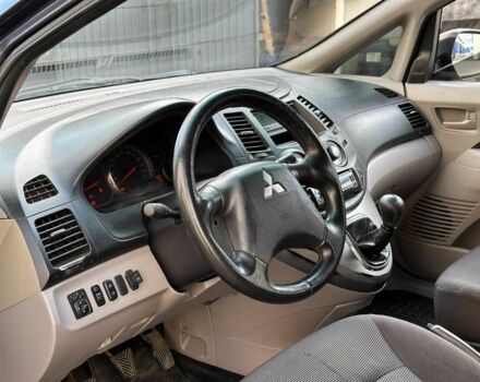 Синий Мицубиси Грандис, объемом двигателя 2.4 л и пробегом 250 тыс. км за 6490 $, фото 6 на Automoto.ua