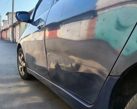 Синий Мицубиси Грандис, объемом двигателя 2.4 л и пробегом 380 тыс. км за 5700 $, фото 3 на Automoto.ua