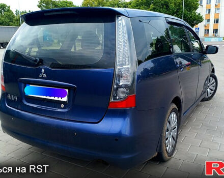 Синий Мицубиси Грандис, объемом двигателя 2.4 л и пробегом 248 тыс. км за 6500 $, фото 3 на Automoto.ua