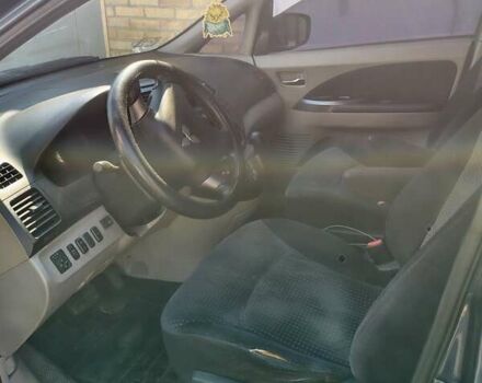 Синий Мицубиси Грандис, объемом двигателя 2.4 л и пробегом 380 тыс. км за 5700 $, фото 10 на Automoto.ua