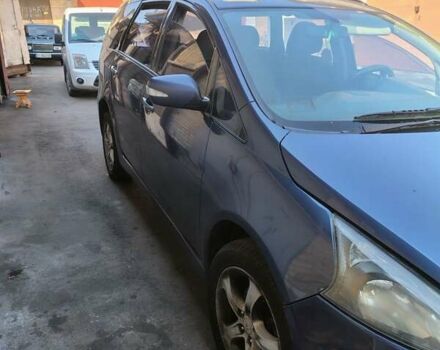 Синий Мицубиси Грандис, объемом двигателя 2.4 л и пробегом 380 тыс. км за 5700 $, фото 1 на Automoto.ua