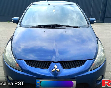 Синий Мицубиси Грандис, объемом двигателя 2.4 л и пробегом 248 тыс. км за 6500 $, фото 1 на Automoto.ua