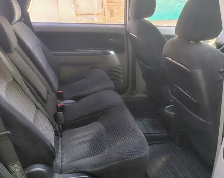 Синий Мицубиси Грандис, объемом двигателя 2.4 л и пробегом 380 тыс. км за 5700 $, фото 4 на Automoto.ua