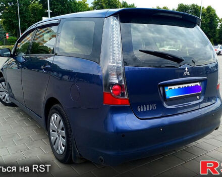 Синий Мицубиси Грандис, объемом двигателя 2.4 л и пробегом 248 тыс. км за 6500 $, фото 5 на Automoto.ua
