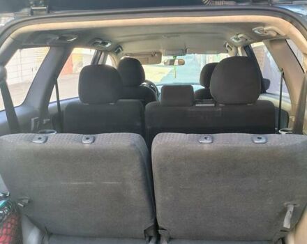 Синий Мицубиси Грандис, объемом двигателя 2.4 л и пробегом 380 тыс. км за 5700 $, фото 6 на Automoto.ua