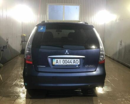 Синій Міцубісі Грандіс, об'ємом двигуна 2.4 л та пробігом 236 тис. км за 6999 $, фото 1 на Automoto.ua