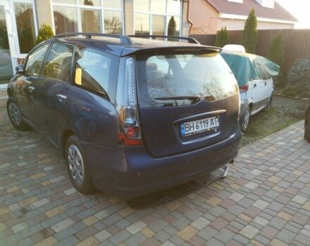 Синий Мицубиси Грандис, объемом двигателя 2.4 л и пробегом 280 тыс. км за 2700 $, фото 2 на Automoto.ua