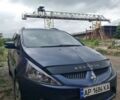 Синий Мицубиси Грандис, объемом двигателя 2.4 л и пробегом 220 тыс. км за 6500 $, фото 1 на Automoto.ua