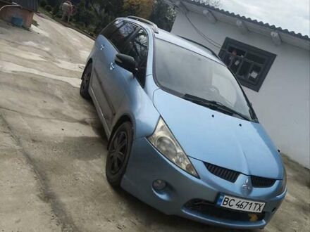 Синий Мицубиси Грандис, объемом двигателя 2.4 л и пробегом 350 тыс. км за 5450 $, фото 1 на Automoto.ua