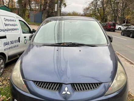 Синий Мицубиси Грандис, объемом двигателя 2.4 л и пробегом 266 тыс. км за 5200 $, фото 1 на Automoto.ua