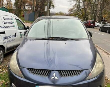 Синий Мицубиси Грандис, объемом двигателя 2.4 л и пробегом 266 тыс. км за 5200 $, фото 1 на Automoto.ua