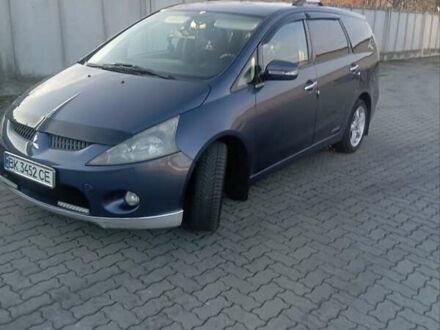 Синий Мицубиси Грандис, объемом двигателя 2 л и пробегом 339 тыс. км за 7000 $, фото 1 на Automoto.ua