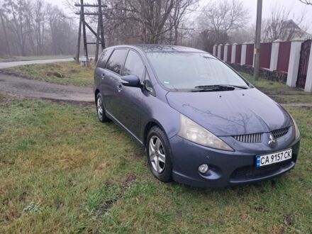 Синий Мицубиси Грандис, объемом двигателя 2 л и пробегом 291 тыс. км за 5400 $, фото 1 на Automoto.ua