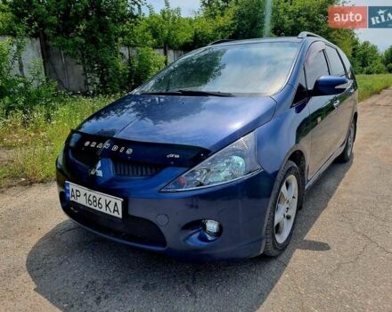 Синий Мицубиси Грандис, объемом двигателя 2.38 л и пробегом 220 тыс. км за 6500 $, фото 1 на Automoto.ua