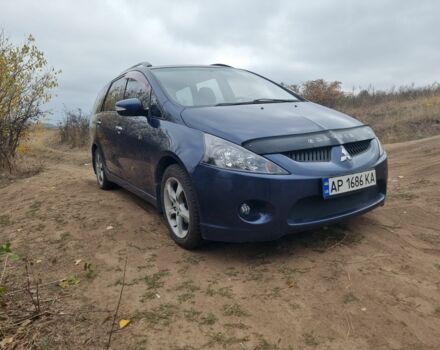 Синий Мицубиси Грандис, объемом двигателя 2.4 л и пробегом 220 тыс. км за 6500 $, фото 1 на Automoto.ua