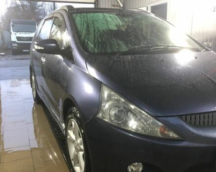 Синий Мицубиси Грандис, объемом двигателя 2.4 л и пробегом 236 тыс. км за 6999 $, фото 1 на Automoto.ua