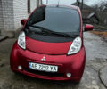 Красный Мицубиси И-Миев, объемом двигателя 0 л и пробегом 67 тыс. км за 10000 $, фото 1 на Automoto.ua