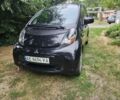 Черный Мицубиси И, объемом двигателя 0 л и пробегом 125 тыс. км за 3700 $, фото 1 на Automoto.ua