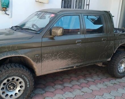 Белый Мицубиси Л 200, объемом двигателя 2.5 л и пробегом 275 тыс. км за 4700 $, фото 18 на Automoto.ua