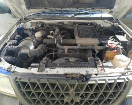 Белый Мицубиси Л 200, объемом двигателя 2.5 л и пробегом 275 тыс. км за 4700 $, фото 5 на Automoto.ua