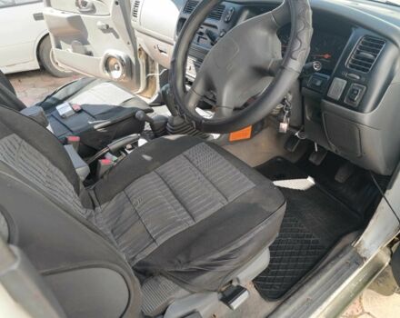 Белый Мицубиси Л 200, объемом двигателя 2.5 л и пробегом 275 тыс. км за 4700 $, фото 7 на Automoto.ua