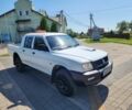 Белый Мицубиси Л 200, объемом двигателя 2.5 л и пробегом 175 тыс. км за 6000 $, фото 1 на Automoto.ua